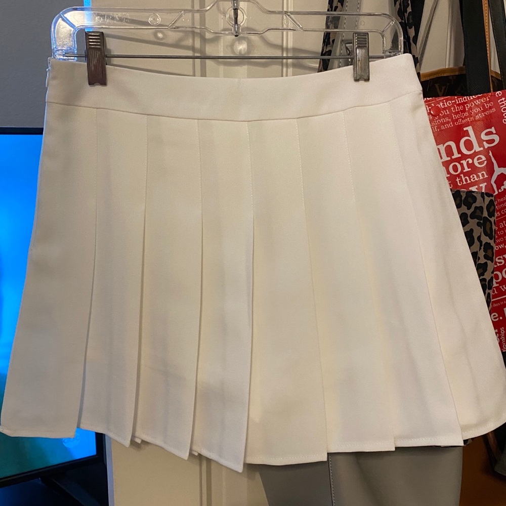 White pleated skirt